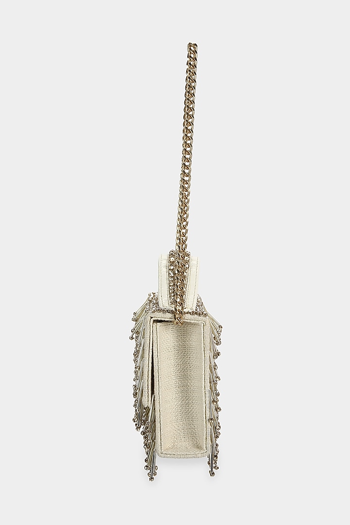 Ivory Embellished Textured Mini Bag by Aanchal Sayal at Pernia's Pop Up Shop