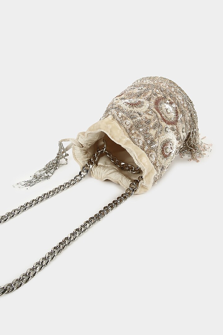 Ivory Silver Embellished Bucket Bag by Aanchal Sayal at Pernia's Pop Up Shop