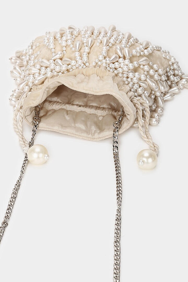 Ivory Embroidered Potli by Aanchal Sayal at Pernia's Pop Up Shop