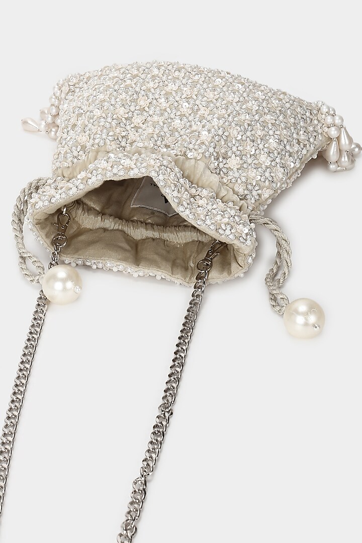 Ivory Velvet Embroidered Potli by Aanchal Sayal at Pernia's Pop Up Shop