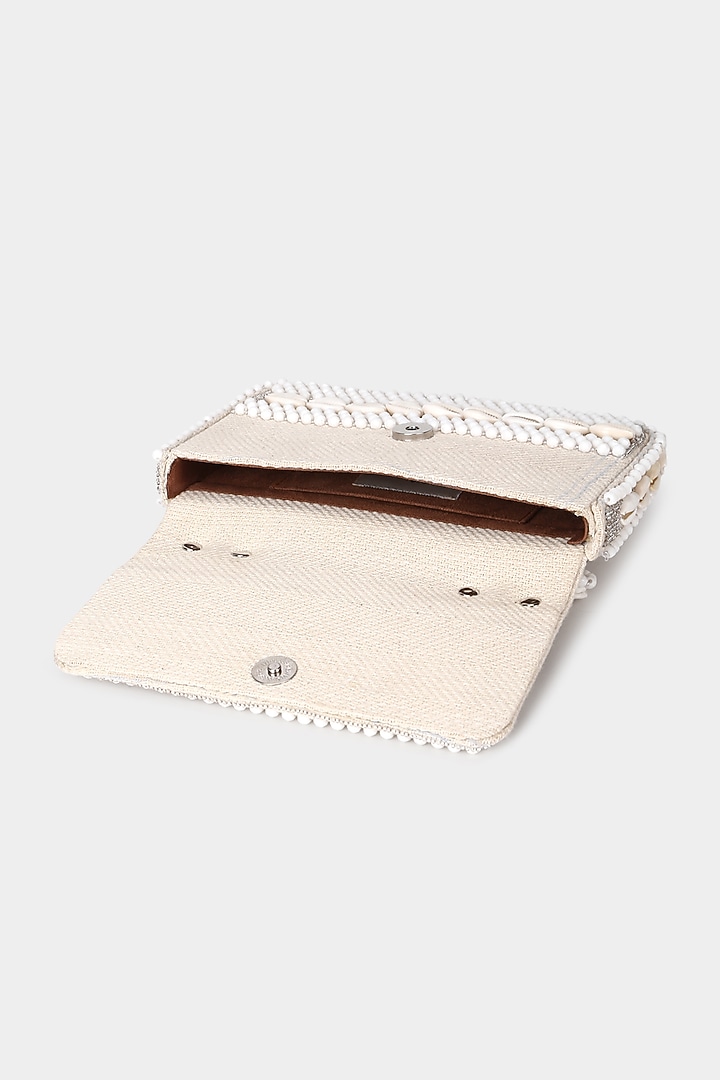 Ivory Seashell Embellished Mini Bag by Aanchal Sayal at Pernia's Pop Up Shop