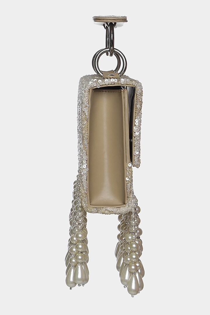 Ivory Beads Embellished Mini Bag by Aanchal Sayal at Pernia's Pop Up Shop