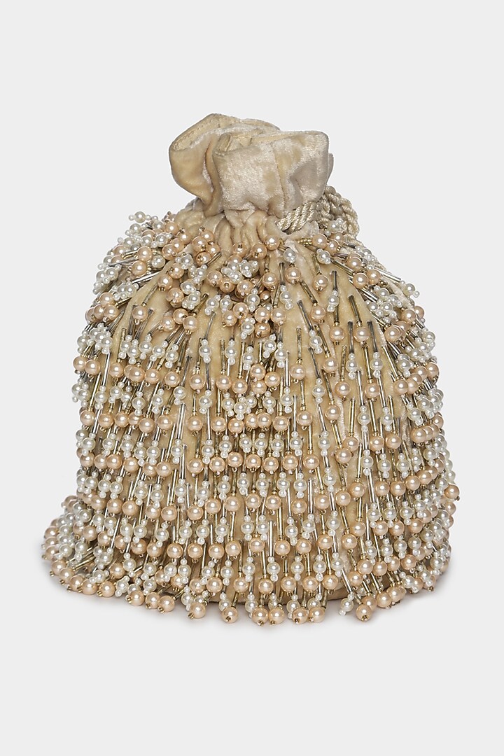 Beige Potli Bucket Bag With Small Pearl Tassels by Aanchal Sayal at Pernia's Pop Up Shop