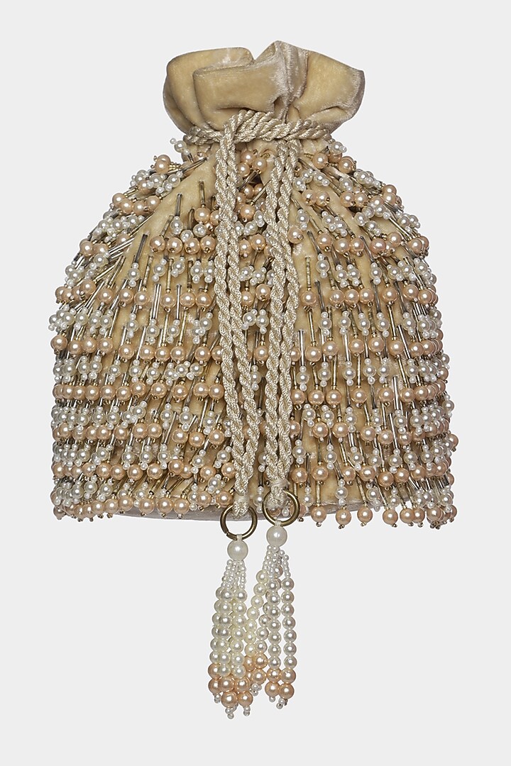 Beige Potli Bucket Bag With Small Pearl Tassels by Aanchal Sayal at Pernia's Pop Up Shop