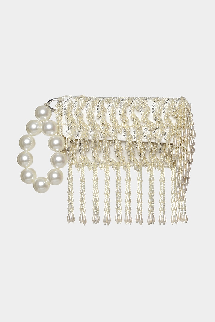 Ivory Mini Bag With Tassel Embellishments by Aanchal Sayal at Pernia's Pop Up Shop
