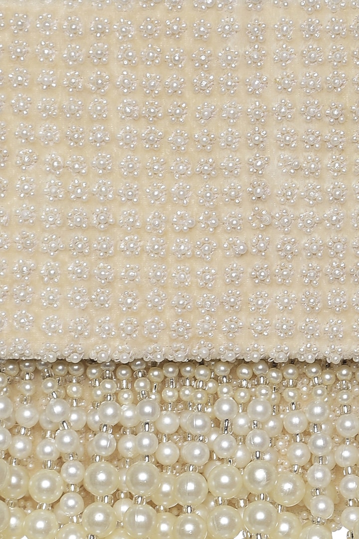 Ivory Faux Leather Mini Bag by Aanchal Sayal at Pernia's Pop Up Shop