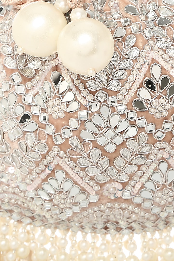 Ivory Velvet Potli With Sequins Work by Aanchal Sayal at Pernia's Pop Up Shop