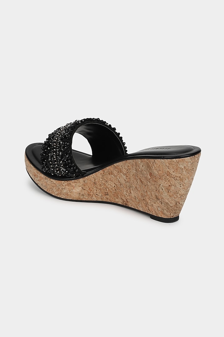 Black Faux Leather Wedges by Aanchal Sayal at Pernia's Pop Up Shop
