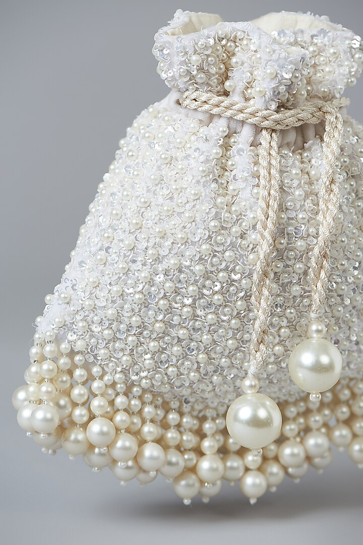Ivory Velvet Pearl Embellished Potli Bag by Aanchal Sayal at Pernia's Pop Up Shop
