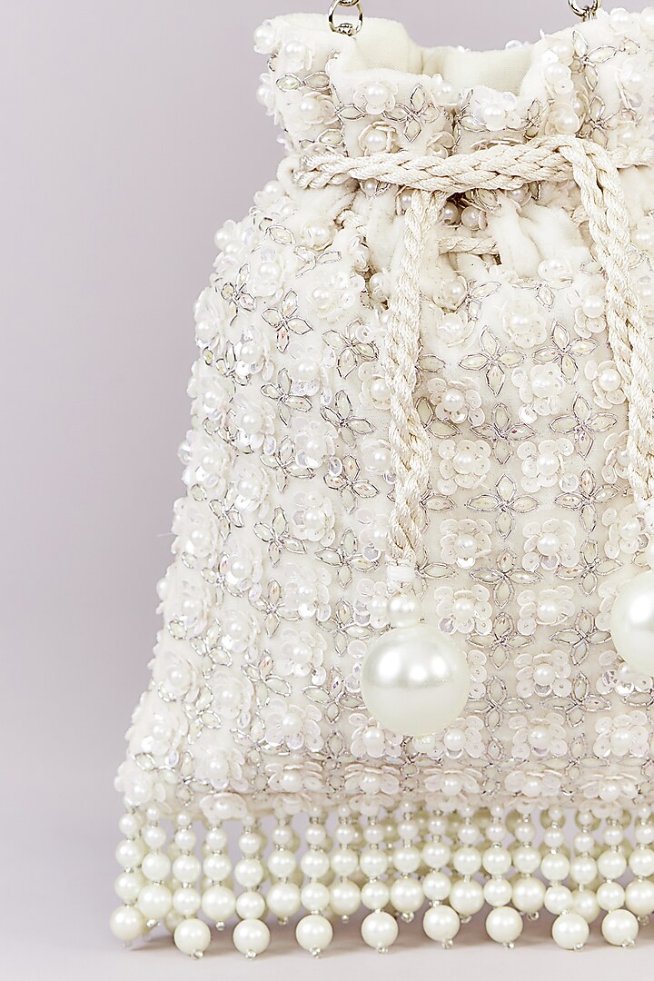 Ivory Velvet Pearl Tassels & Sequins Embroidered Potli by Aanchal Sayal at Pernia's Pop Up Shop