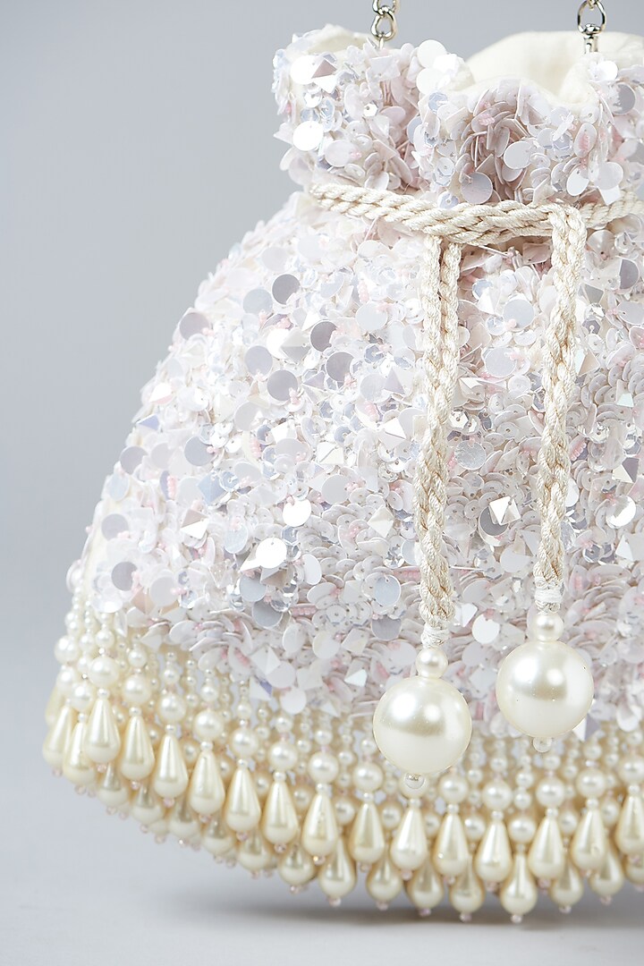 Ivory Velvet Sequins Embroidered Potli Bag by Aanchal Sayal at Pernia's Pop Up Shop