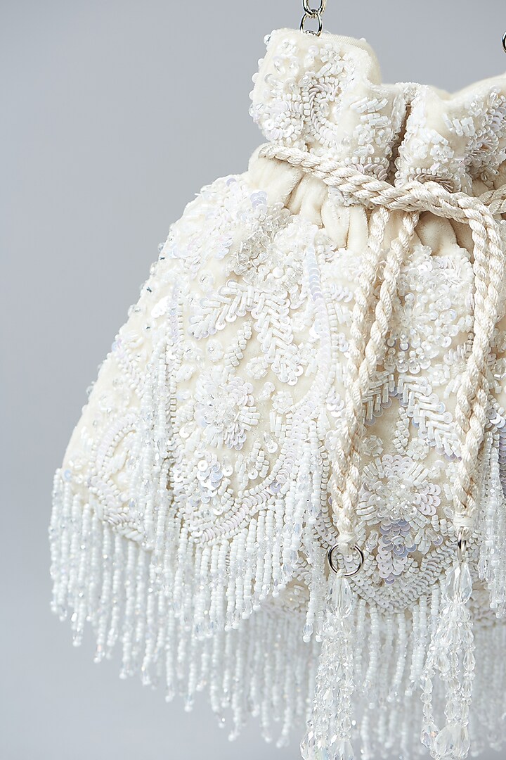 Ivory Velvet Sequins Embroidered Potli Bag by Aanchal Sayal at Pernia's Pop Up Shop