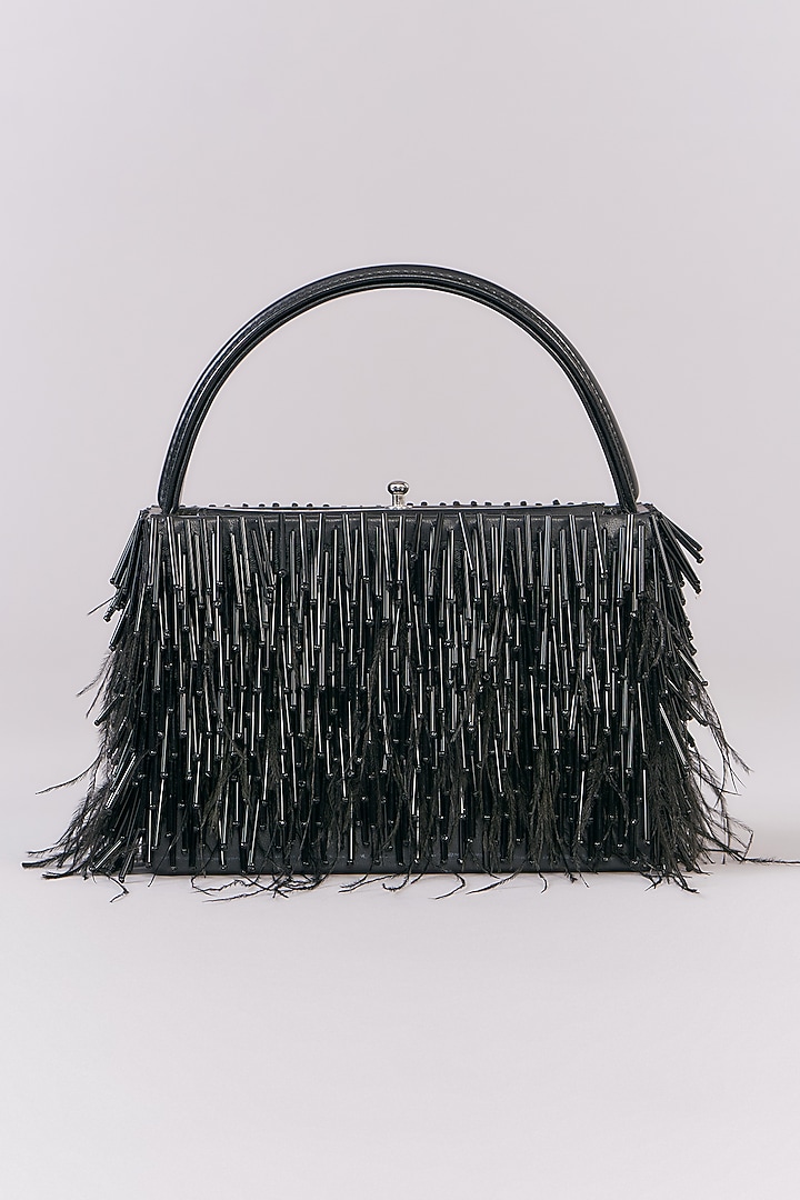 Black Faux Leather Feather & Pipe Work Clutch by Aanchal Sayal at Pernia's Pop Up Shop
