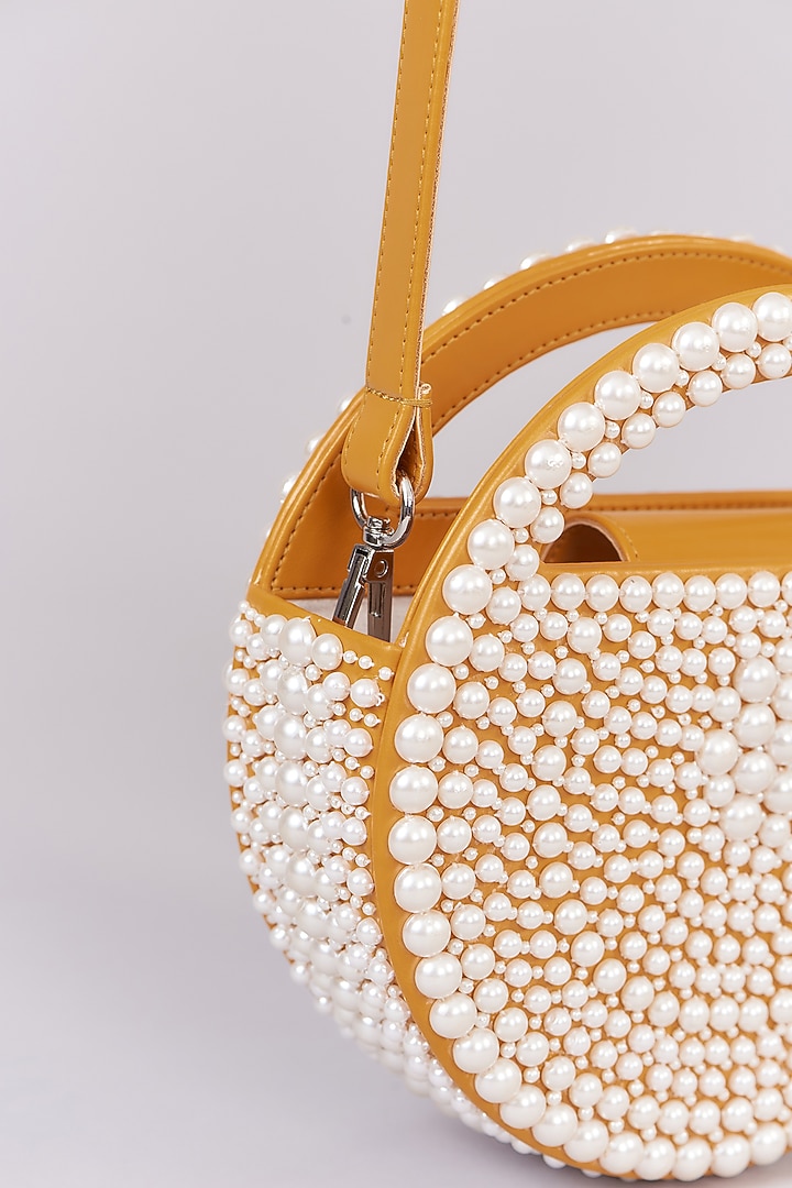 Mustard Faux Leather Pearl Embroidered Clutch by Aanchal Sayal at Pernia's Pop Up Shop