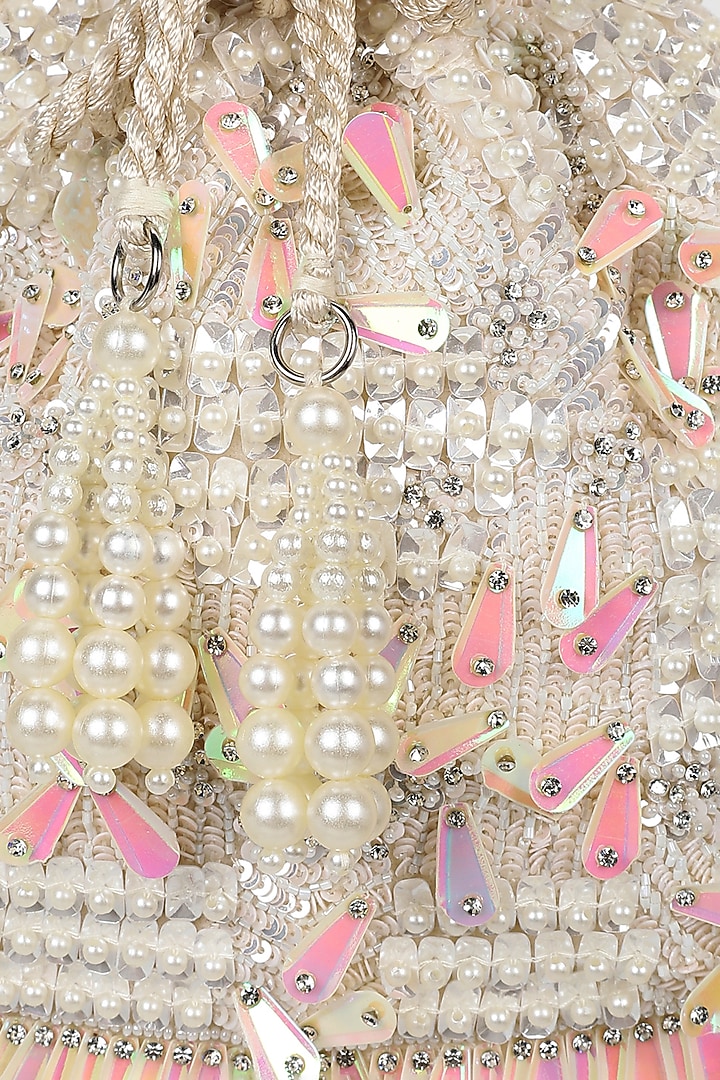 Ivory Velvet Pearl Embroidered Potli by Aanchal Sayal at Pernia's Pop Up Shop