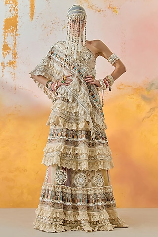 Mogra White Sheer Silk Tiered Ruffled Lehenga Set by ASEEM KAPOOR