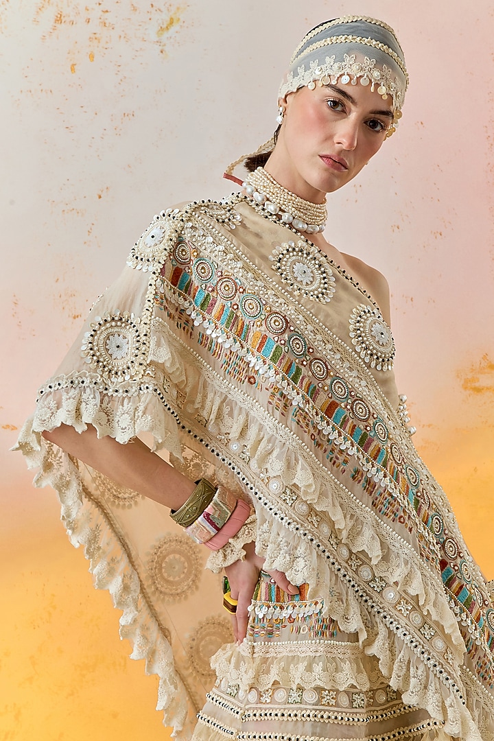 Mogra White Sheer Silk Tiered Ruffled Bridal Lehenga Set by ASEEM KAPOOR at Pernia's Pop Up Shop
