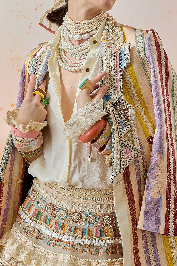 Mogra White Sheer Silk & Net Tiered Ruffled Jacket Bridal Lehenga Set by ASEEM KAPOOR at Pernia's Pop Up Shop