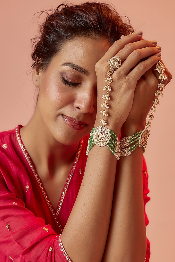 Gold Finish Yellow Kundan Polki & Mint Pearl Hathphools (Set Of 2) by ASHNEE at Pernia's Pop Up Shop