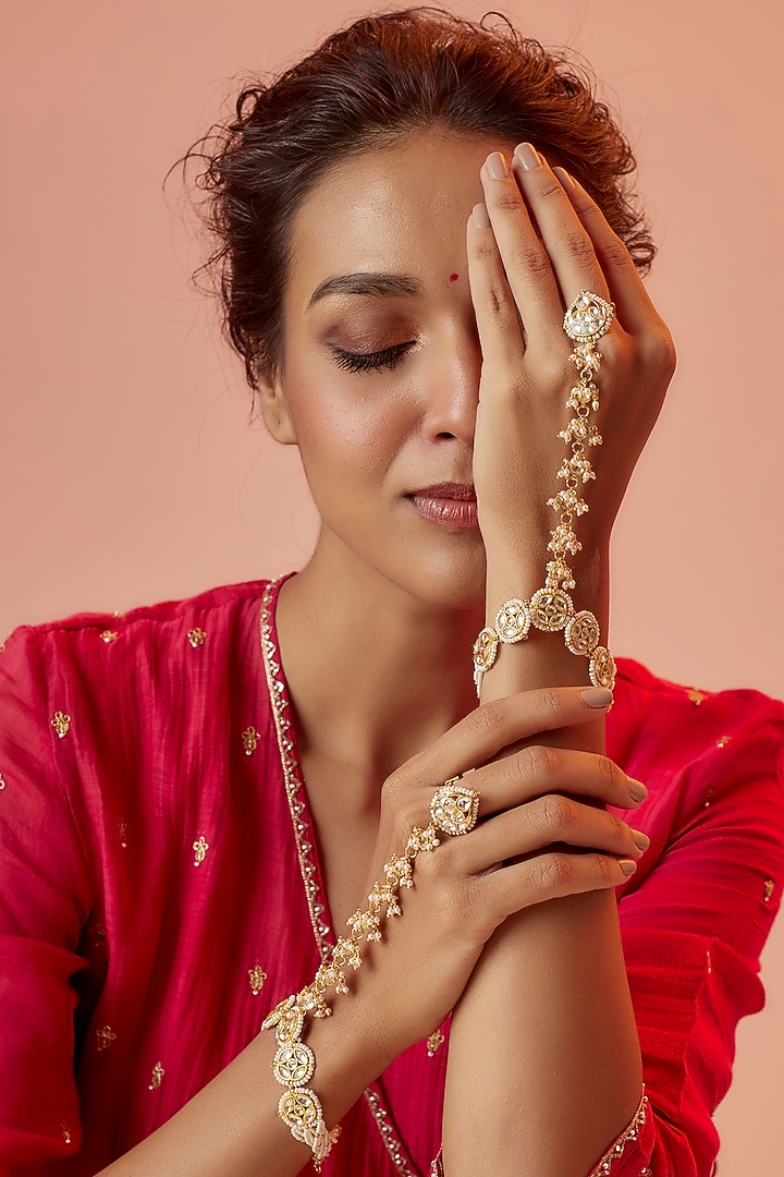 Gold Finish Yellow Kundan Polki & Pearl Hathphools (Set Of 2) by ASHNEE at Pernia's Pop Up Shop