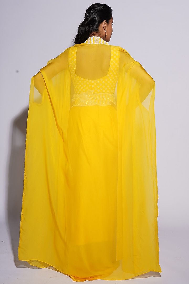 Yellow Bemberg Satin Cutwork Draped Skirt Set by ASHUTOSH JOSHI at Pernia's Pop Up Shop