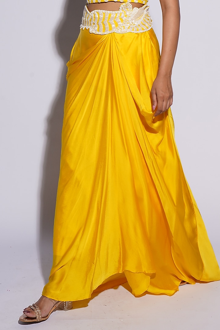 Yellow Bemberg Satin Cutwork Draped Skirt Set by ASHUTOSH JOSHI at Pernia's Pop Up Shop