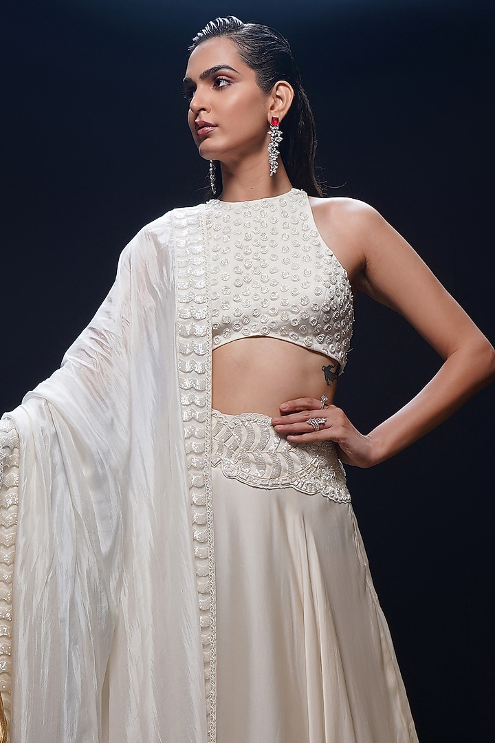 Ivory Bemberg Satin Abstract Cutwork Wedding Lehenga Set by ASHUTOSH JOSHI at Pernia's Pop Up Shop