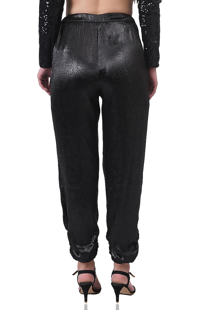 Black Emboss Satin Jogger Pants by Attic Salt at Pernia's Pop Up Shop