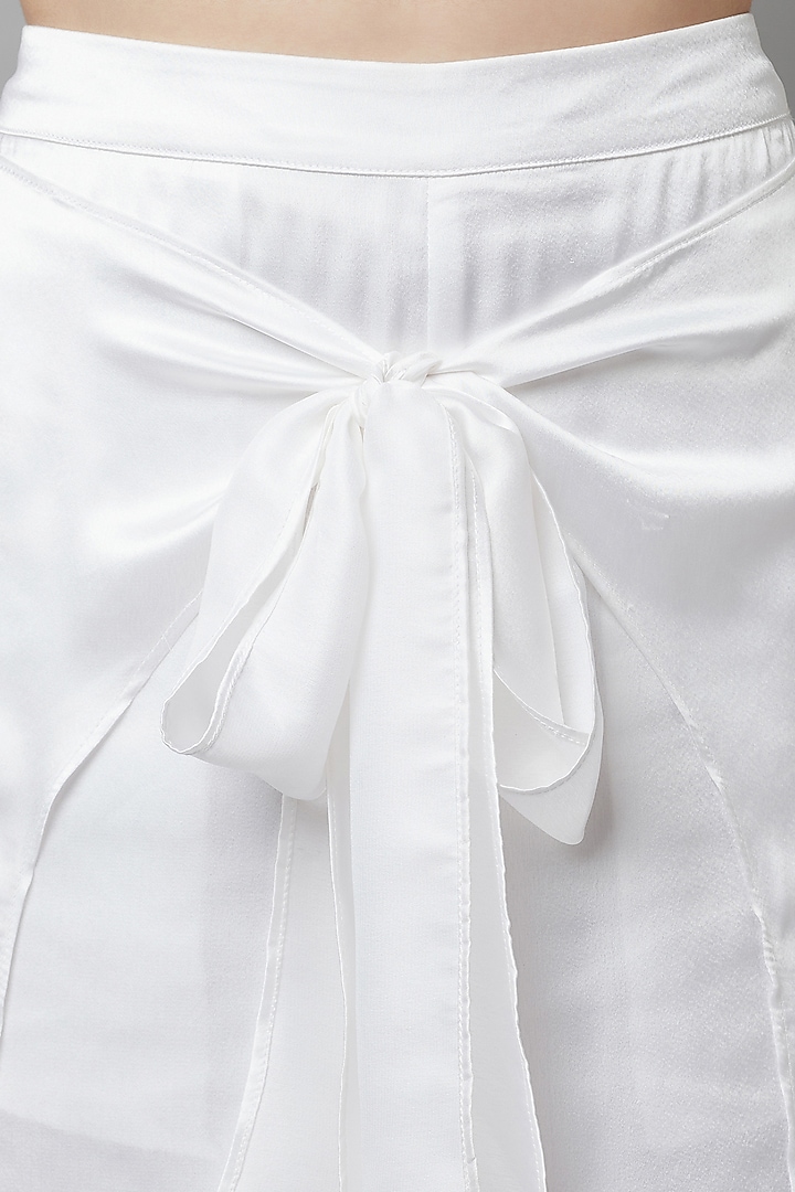 White Poly Satin Wrap Bow Palazzo Pants by Attic Salt at Pernia's Pop Up Shop