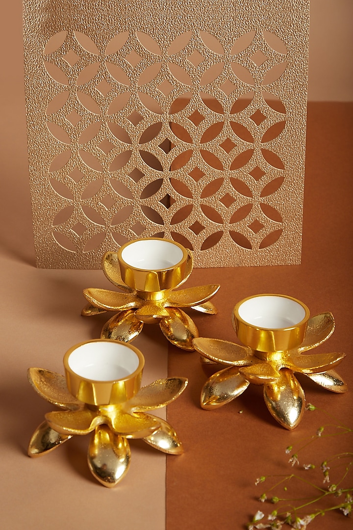 Gold Lotus T-Light Holders (Set of 3) by Assemblage at Pernia's Pop Up Shop