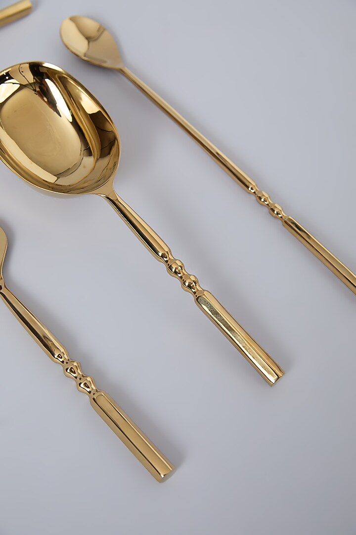 Gold PVD Coated & Steel Twisted Bar Set Of 4 by Assemblage at Pernia's Pop Up Shop