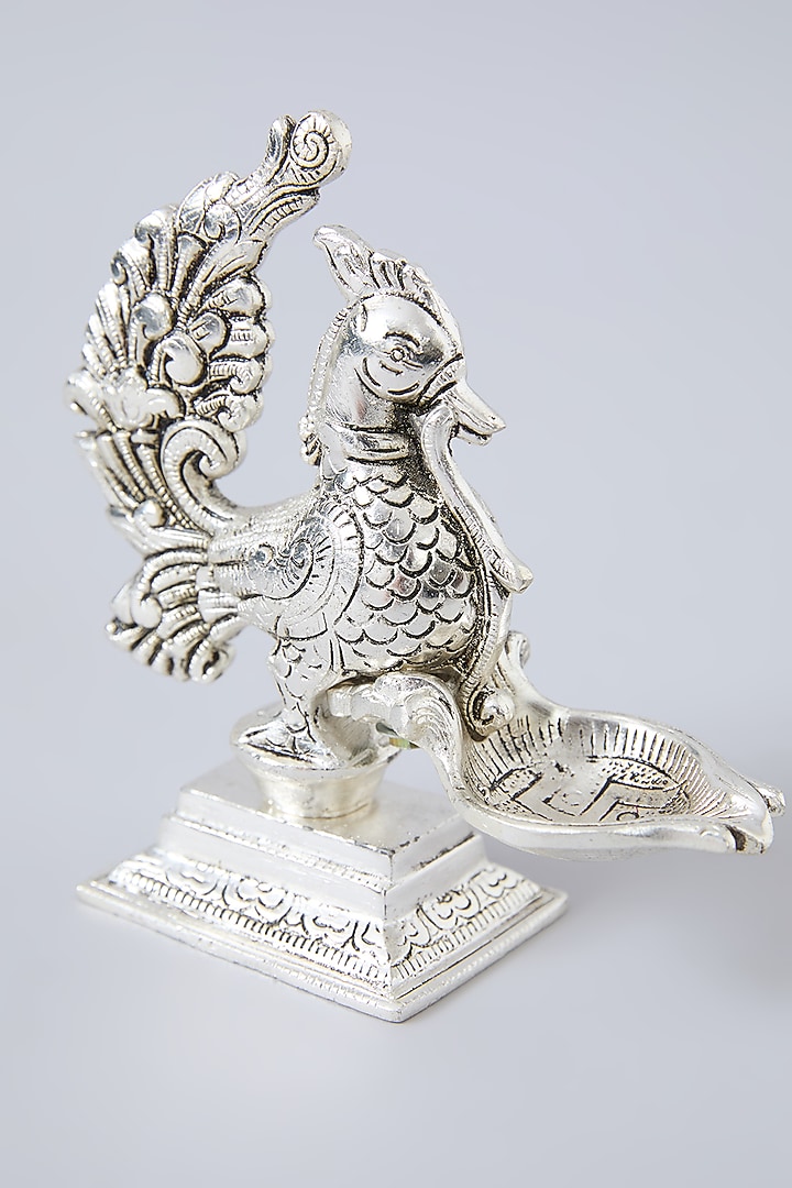 German Silver Dancing Peacock Diya by Assemblage at Pernia's Pop Up Shop