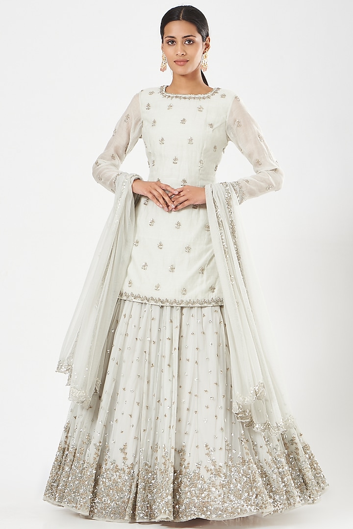 Ivory Net & Chanderi Sequins Embroidered Skirt Set by Astha Narang