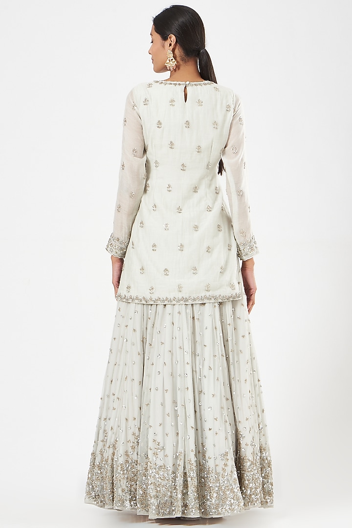Ivory Net & Chanderi Sequins Embroidered Skirt Set by Astha Narang at Pernia's Pop Up Shop