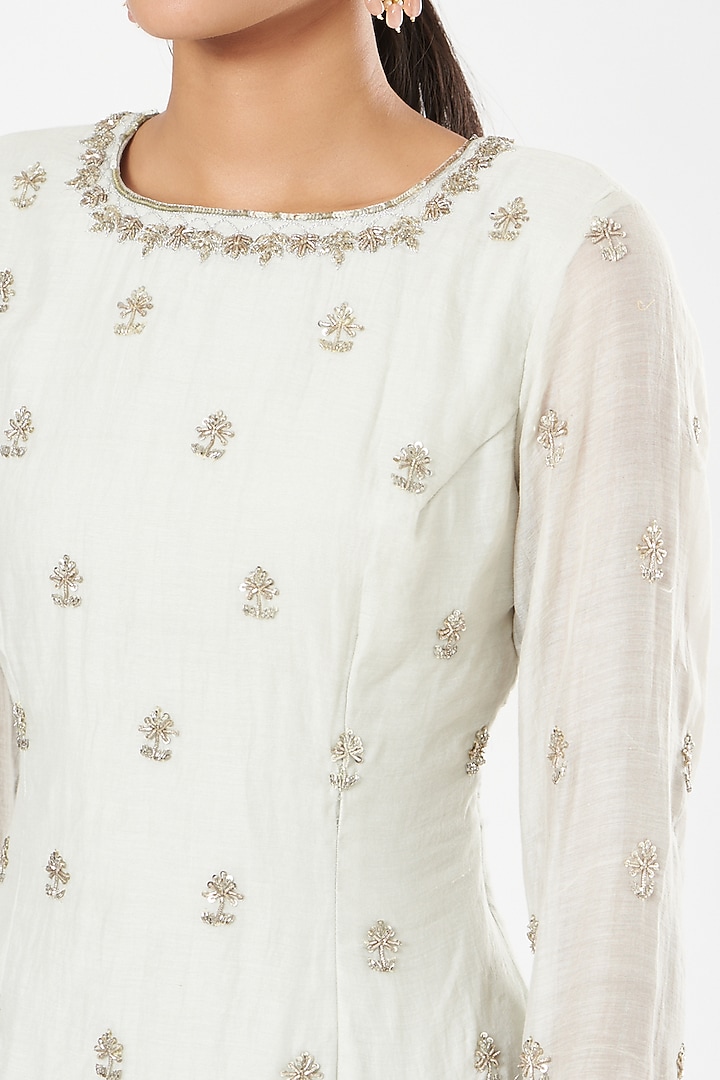 Ivory Net & Chanderi Sequins Embroidered Skirt Set by Astha Narang at Pernia's Pop Up Shop