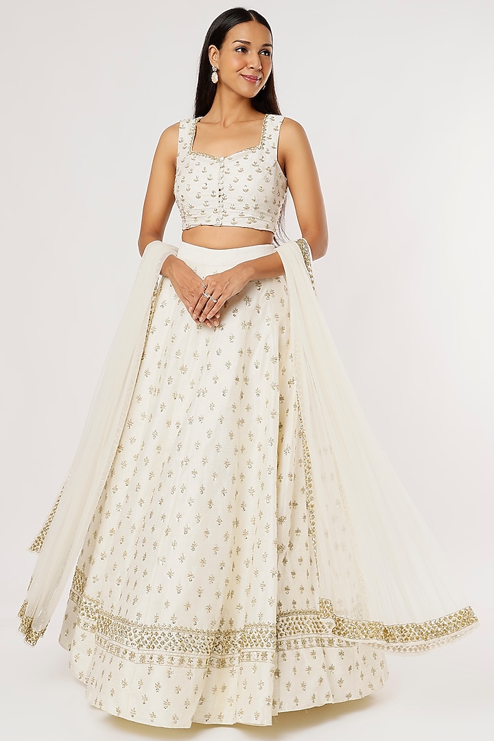 Ivory Net Sequins Embroidered Lehenga Set Design by Astha Narang at ...