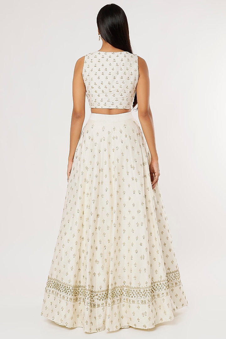 Ivory Net Sequins Embroidered Wedding Lehenga Set by Astha Narang at Pernia's Pop Up Shop