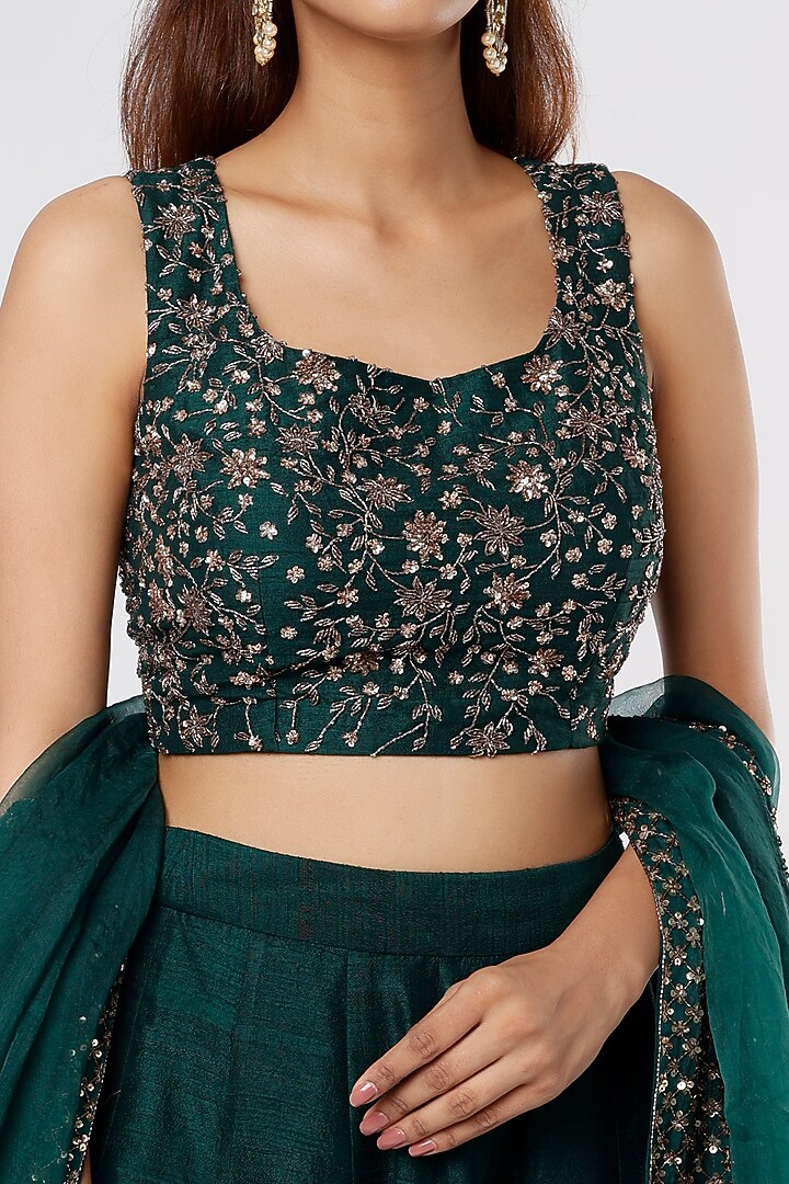 Bottle Green Raw Silk Sequins Embroidered Wedding Lehenga Set by Astha Narang at Pernia's Pop Up Shop