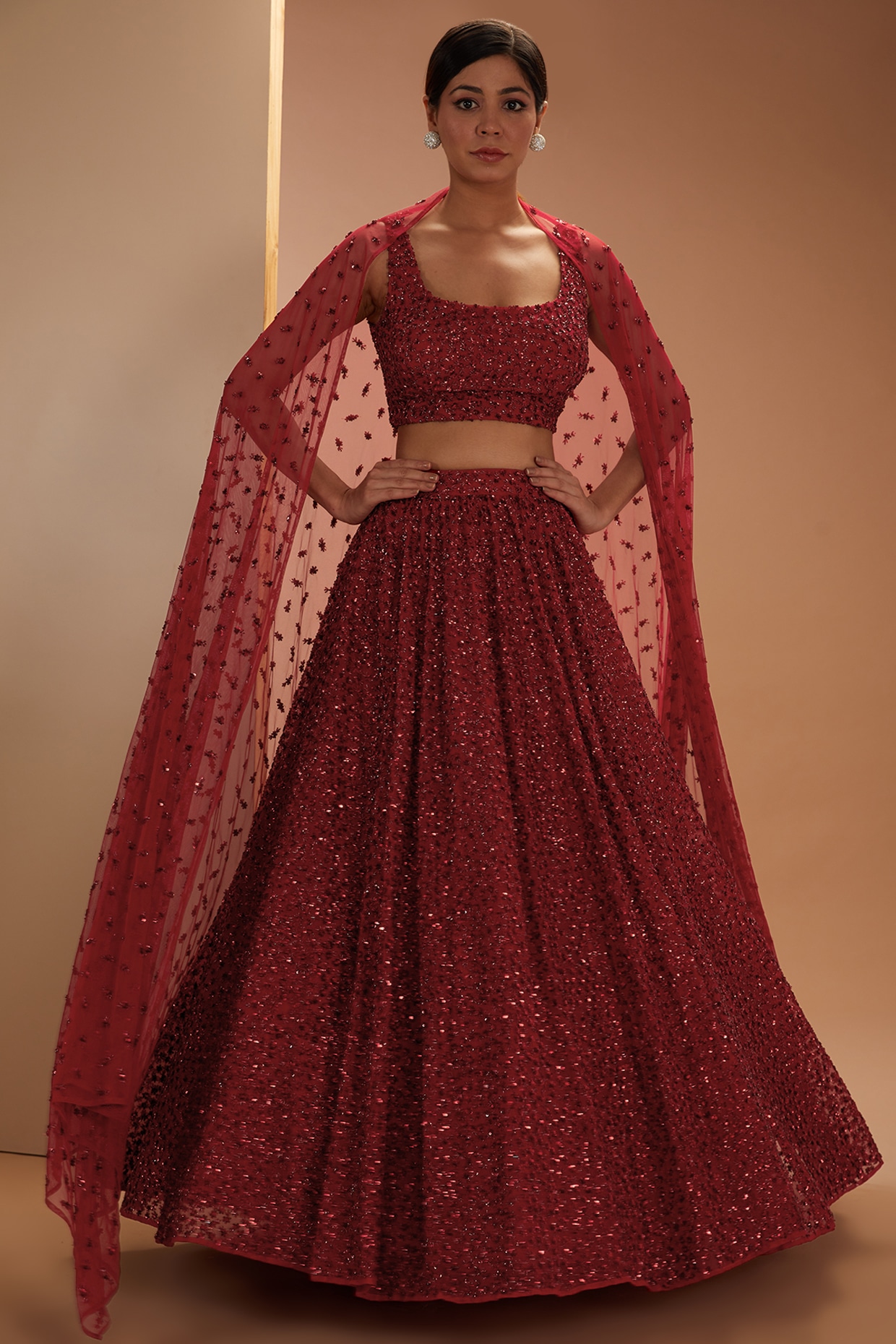 Astha narang red lehenga best sale