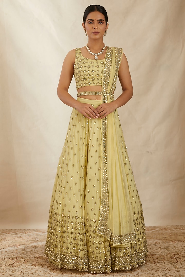 Yellow Net & Crepe Embroidered Lehenga Set by Astha Narang