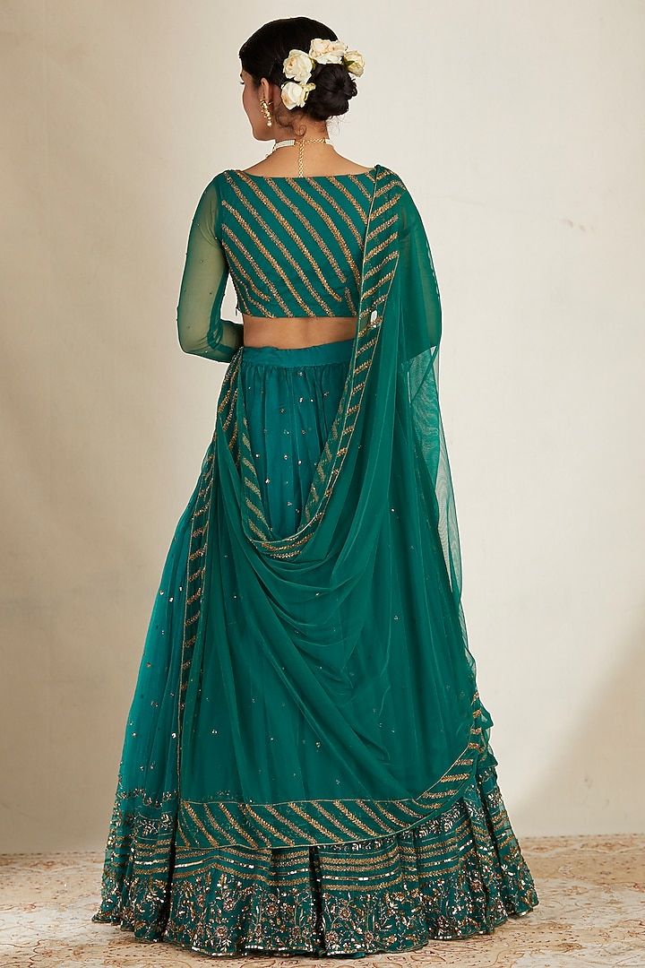 Teal Green Net & Crepe Sequins Embroidered Wedding Lehenga Set by Astha Narang at Pernia's Pop Up Shop
