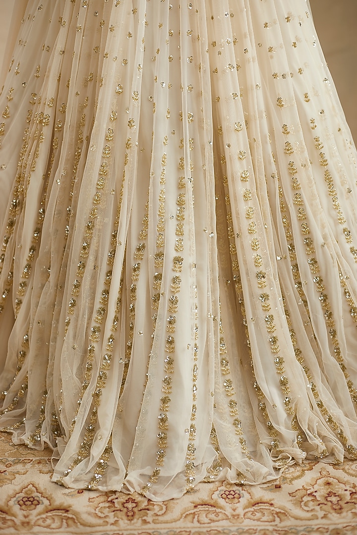 Off-White Net & Crepe Line Embroidered Wedding Lehenga Set by Astha Narang at Pernia's Pop Up Shop