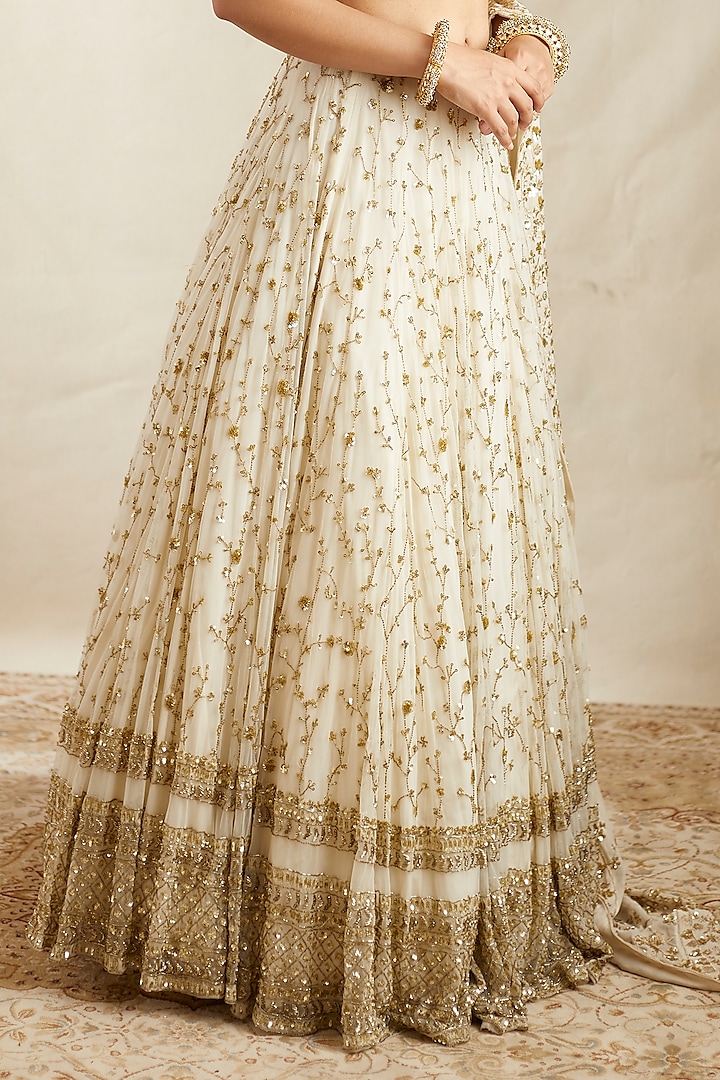 Off-White Net Boota embroidred Bridal Lehenga Set by Astha Narang at Pernia's Pop Up Shop