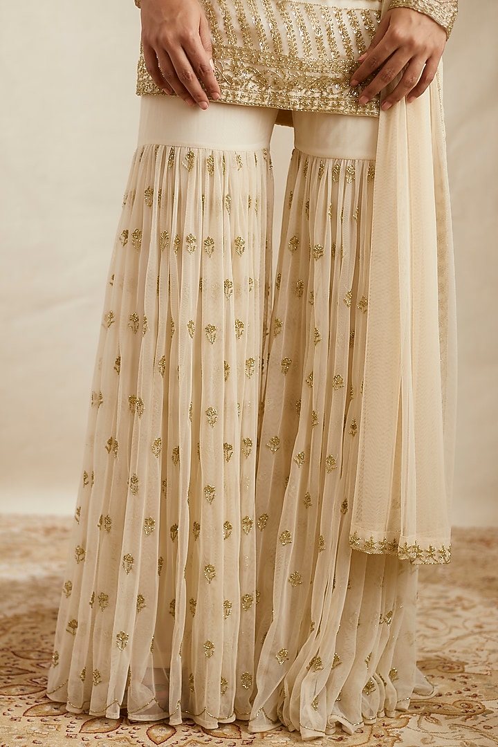 Off-White Net Bridal Sharara Set by Astha Narang at Pernia's Pop Up Shop