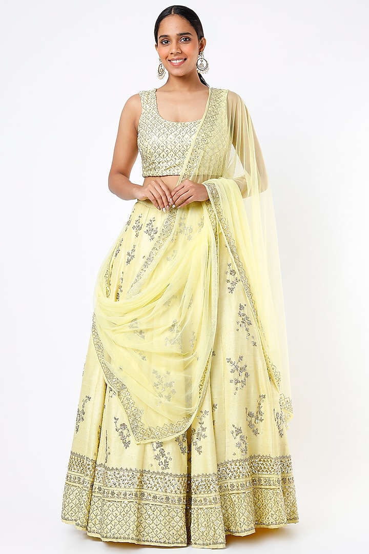 Cream Yellow Raw Silk Boota Embroidered Lehenga Set by Astha Narang