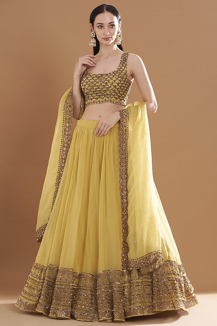 Yellow Net & Crepe Embroidered Lehenga Set by Astha Narang