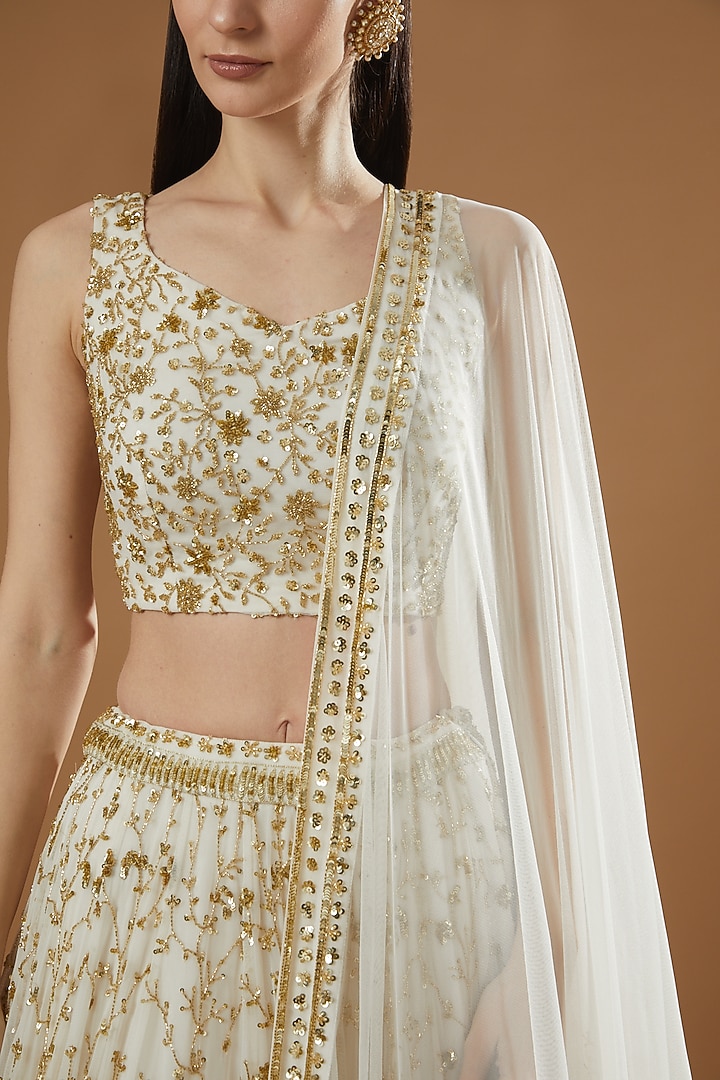 Off-White Net & Crepe Boota Embroidered Wedding Lehenga Set by Astha Narang at Pernia's Pop Up Shop