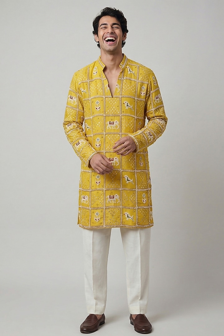 Yellow Silk Tissue Patola Handwork Kurta by AASTHASHAH at Pernia's Pop Up Shop