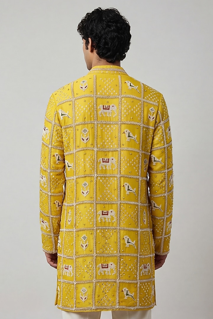 Yellow Silk Tissue Patola Handwork Kurta by AASTHASHAH at Pernia's Pop Up Shop