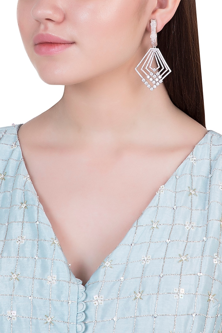 Rose gold plated diamond pave earrings by Aster